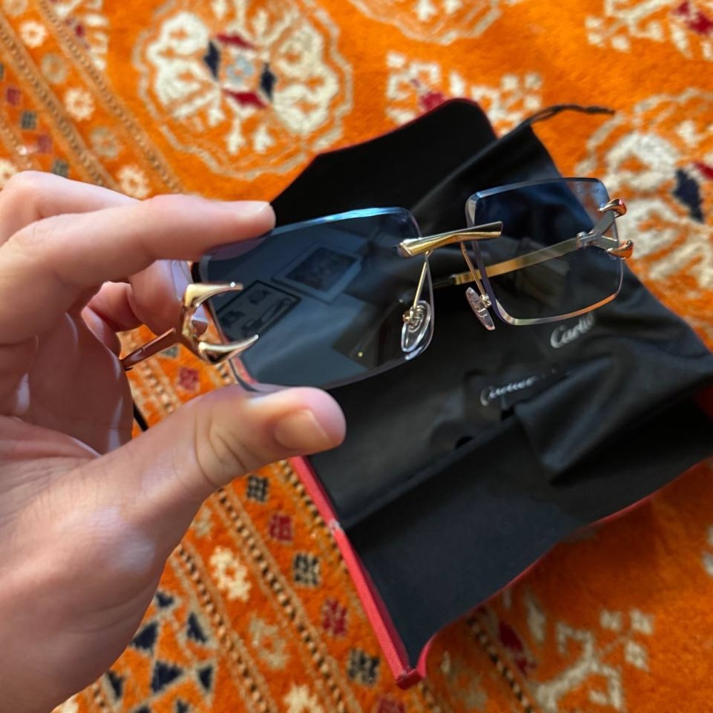 Cartier Gold and Black Sunglasses with Thin Wire-Frame Design